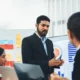 Leadership coach helping team solve issue